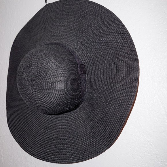 large black floppy sun hat